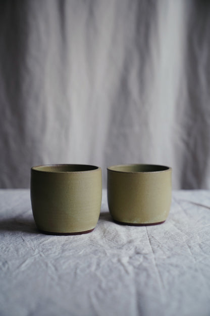 green ceramic tumbler
