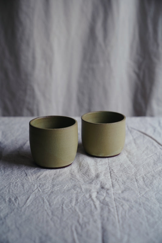 green ceramic tumbler