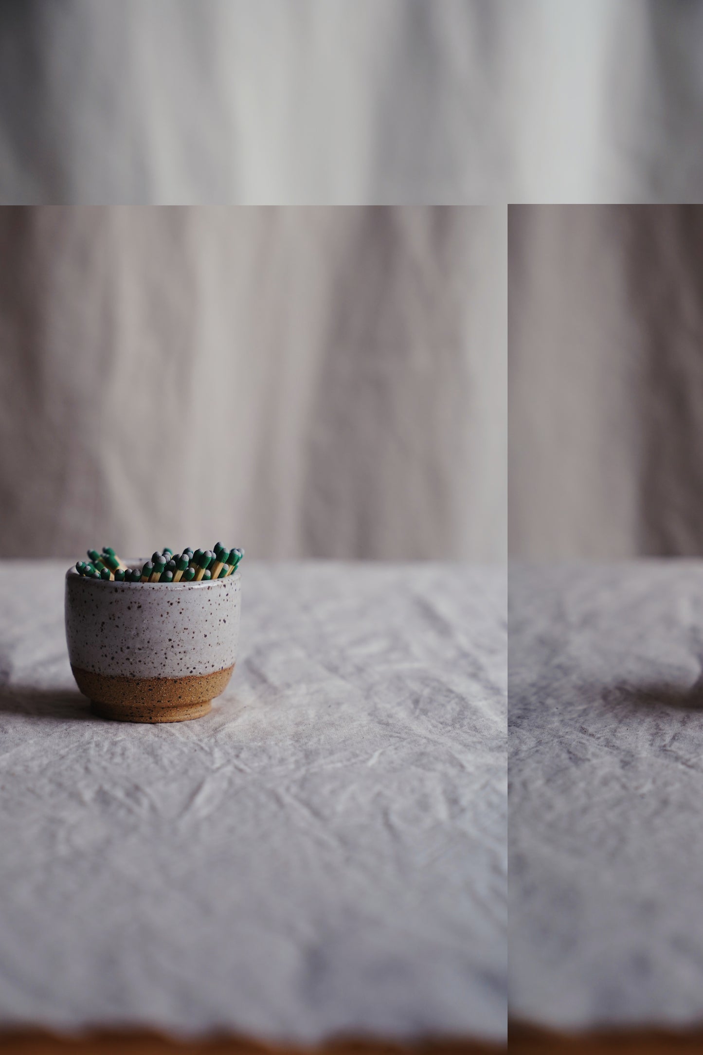 white speckled match holder