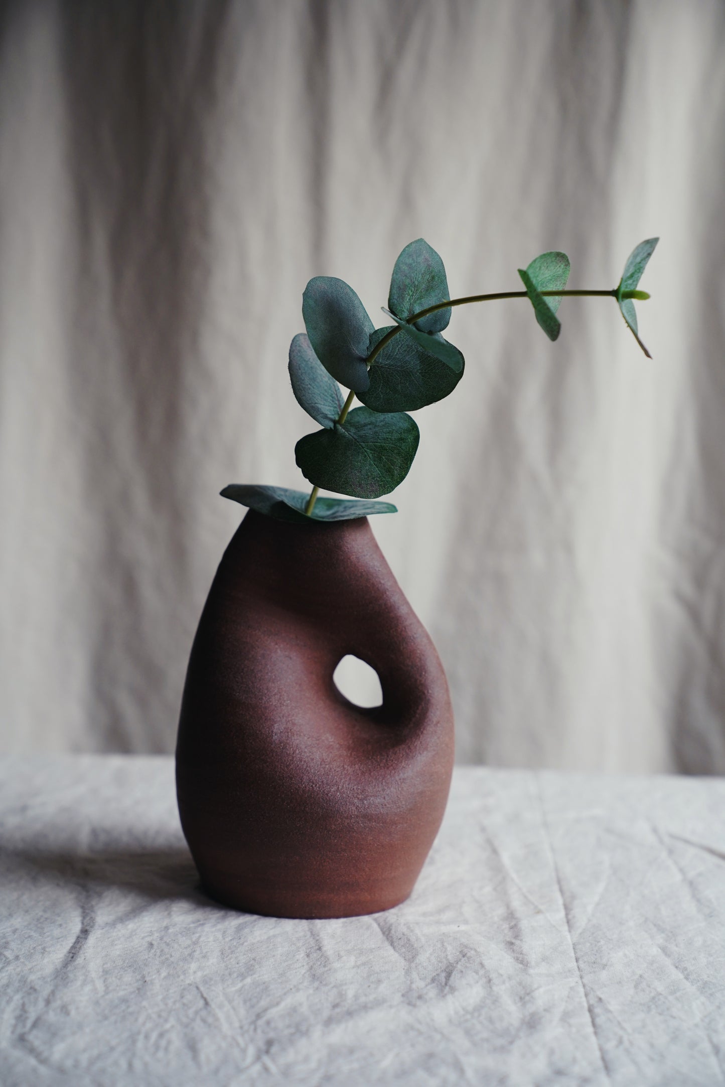 terracotta sculpture vase