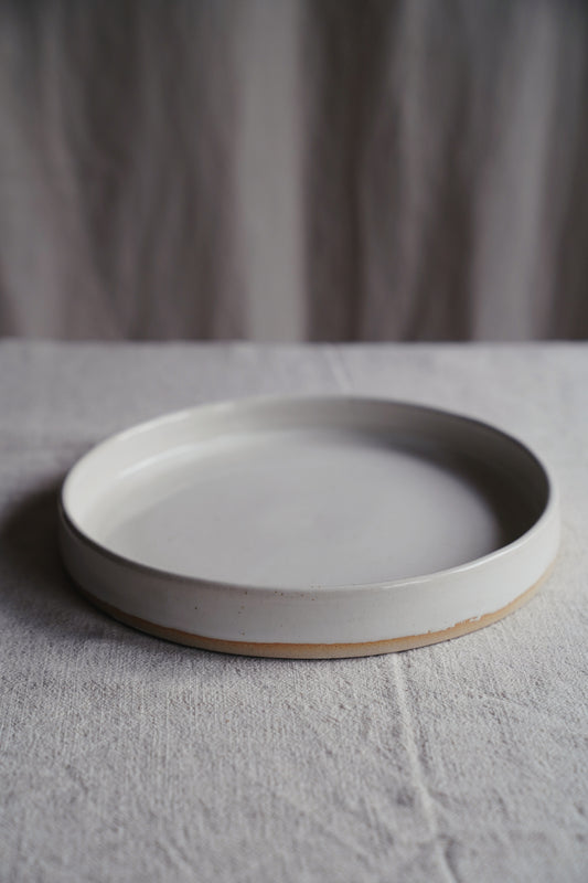 rimmed white plate