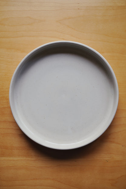 rimmed white plate