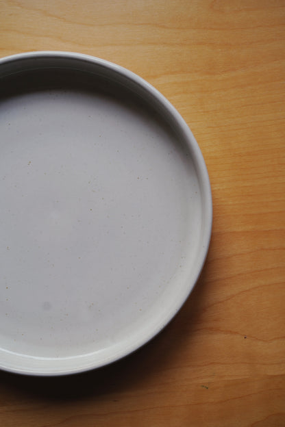 rimmed white plate
