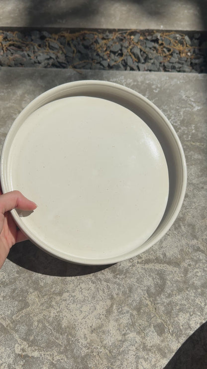 rimmed white plate